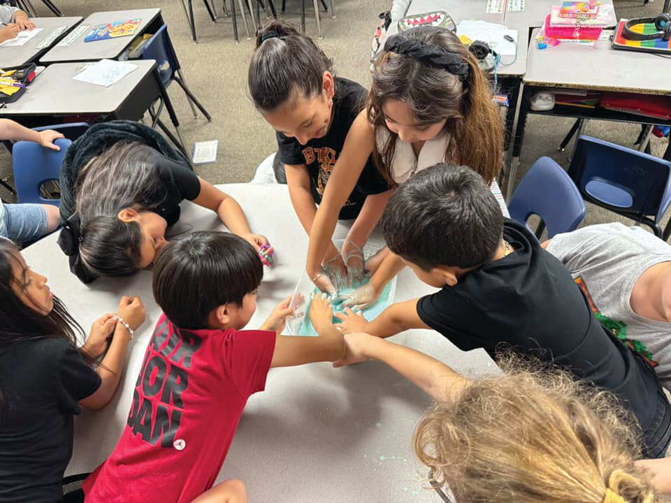 LABELLE -- Upthegrove Elementary School students in AmandaCruz’s class made Oobleck  last week. They have been learning about states of matter. Oobleck can have properties of both a solid and liquid. [Photo courtesy Upthegrove Elementary]